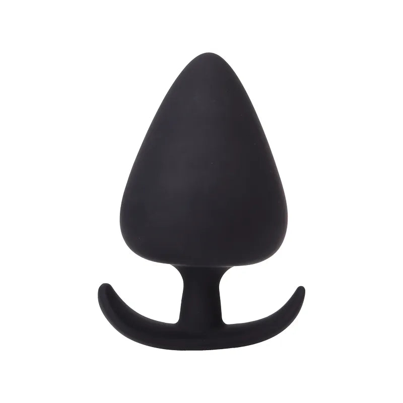 Image d'un plug anal en silicone noir médical, le plug a une forme d'as de pique mais le bout lui est plus rond.